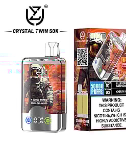 Crystal Twin 50K vape device and packaging featuring an astronaut illustration, with text highlighting 50,000 puffs, two flavors (blueberry raspberry and cherry ice), and a nicotine warning label.