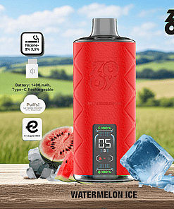 Red ZOOY vape device labeled 'Watermelon Ice' with digital display, surrounded by ice cubes and watermelon slices on a wood surface, set against a scenic green countryside background.