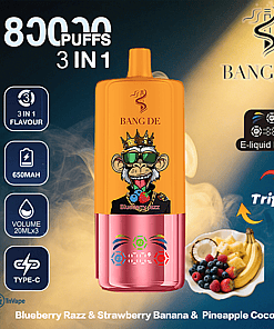 Promotional image for BANG DE 3-in-1 vape featuring a cartoon monkey with sunglasses and a crown, highlighting 8000 puffs, 650mAh battery, E-liquid display, Type-C charging, and flavors Blueberry Razz, Strawberry Banana, and Pineapple Coconut with a fruit plate illustration.